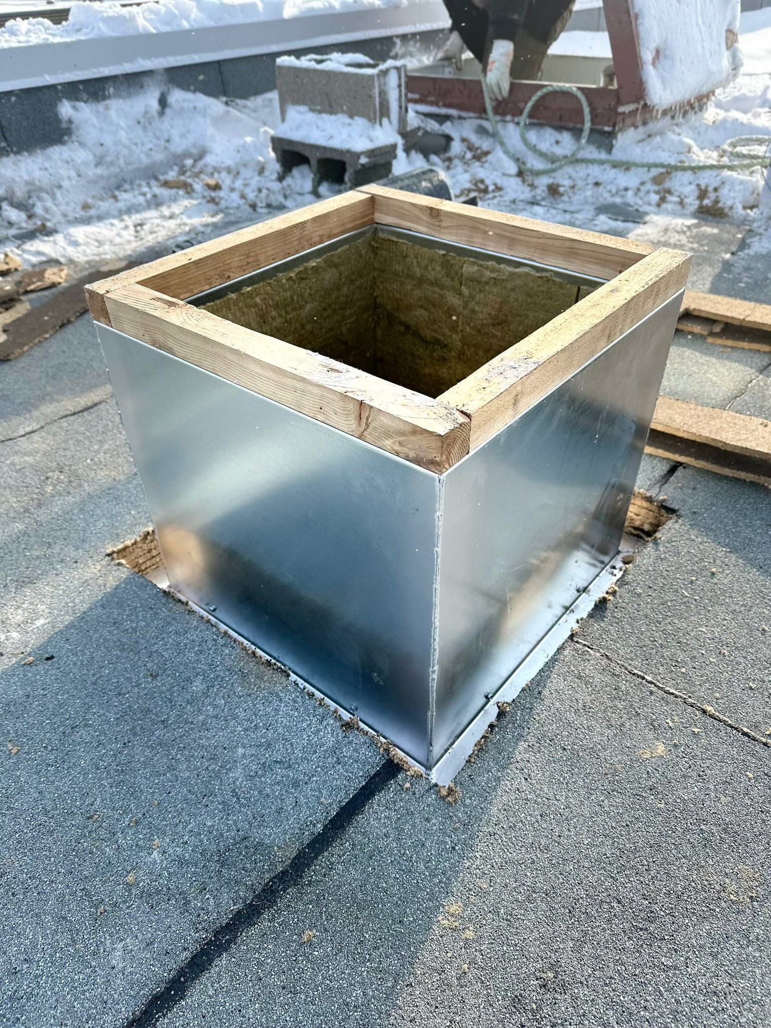Before — deteriorated skylight flashing