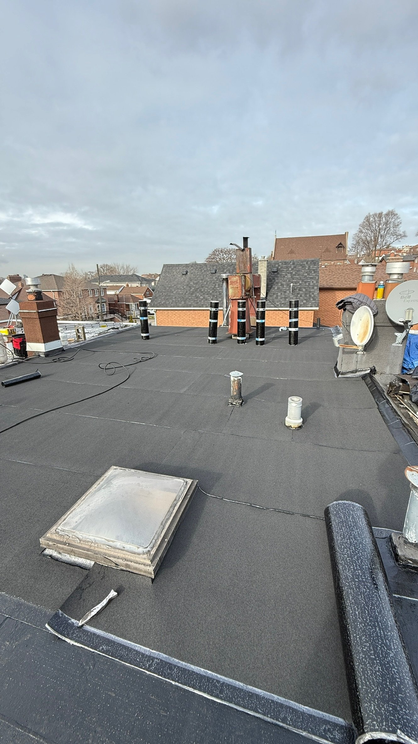 Before — flat roof mid-renovation